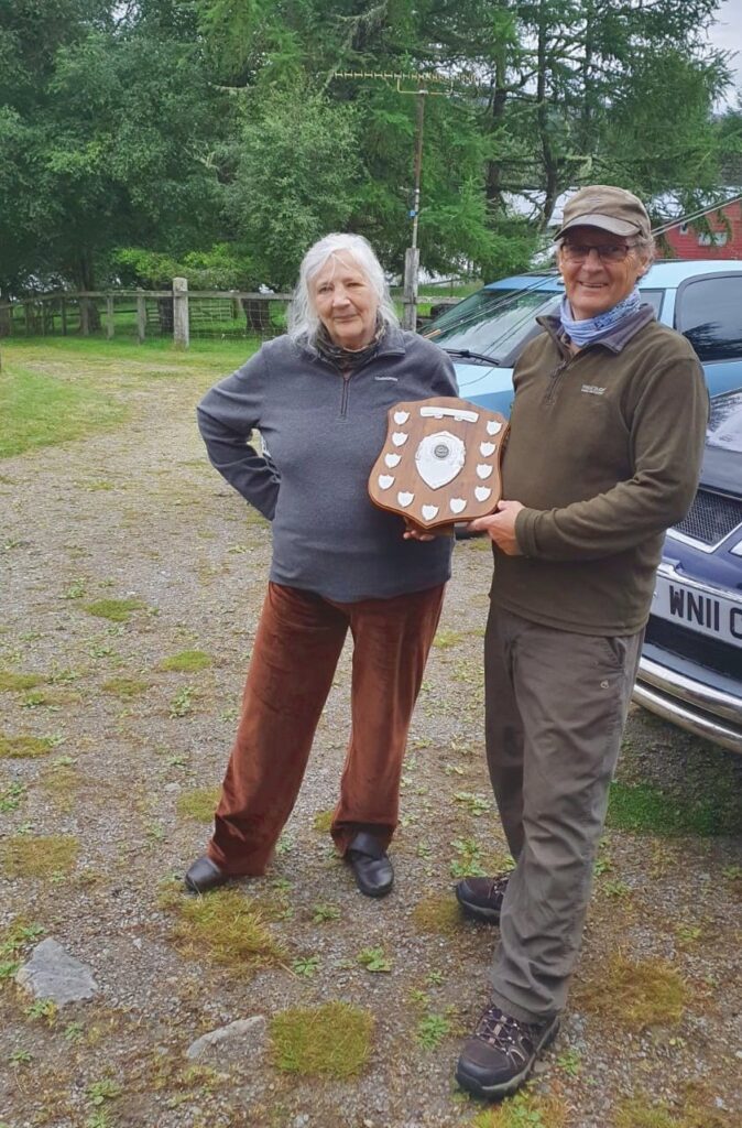 Chair presenting the new Senior Trophy to Jim Braithwaite