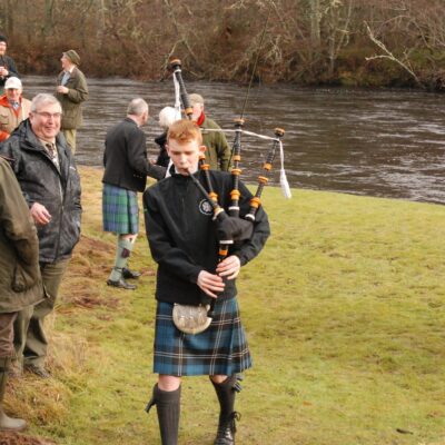 The Piper leading the way back for refreshments and discussions about this new Season