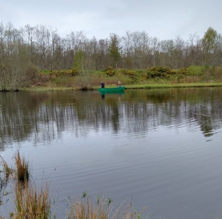 Weed Clearing at Orrin - boat laying down the saw chain to cut the weed. April 2024